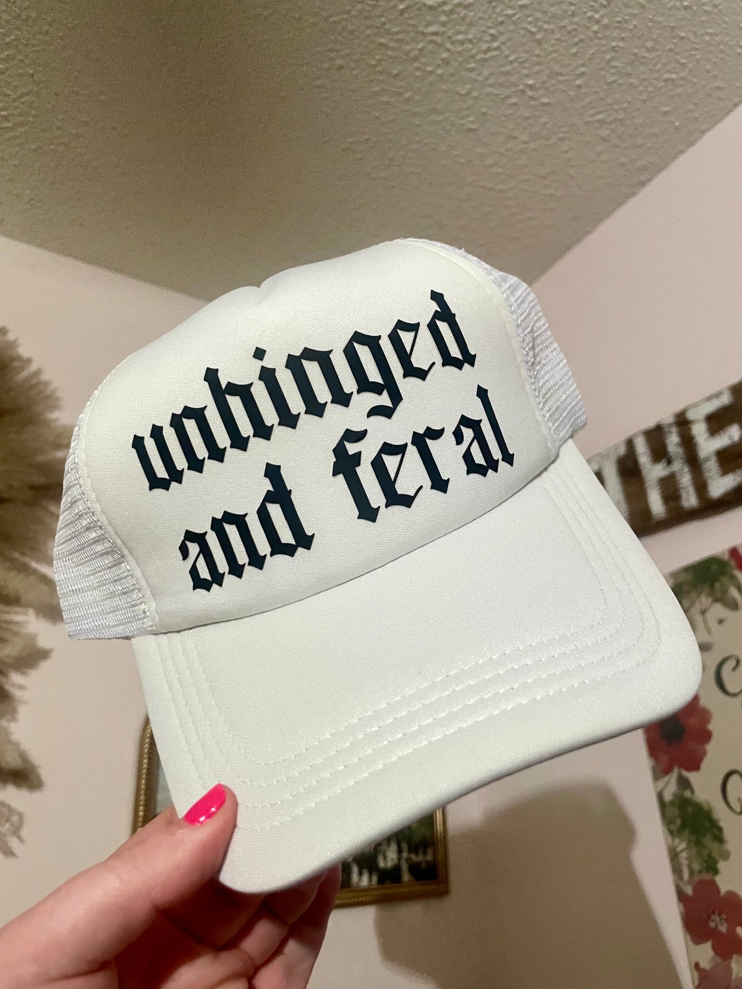 unhinged & feral trucker hat